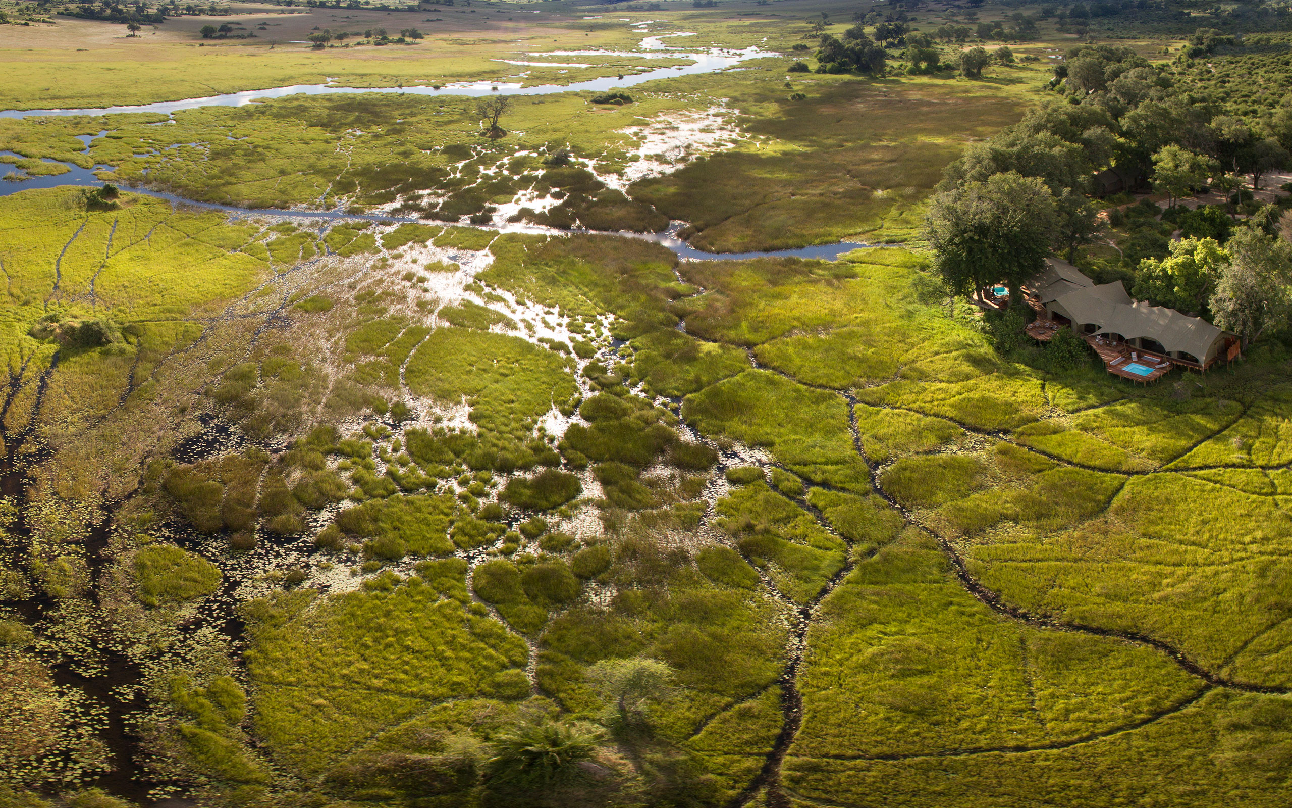 duba plains camp suites aerial panorama enkosi africa botswana delta okavango safari
