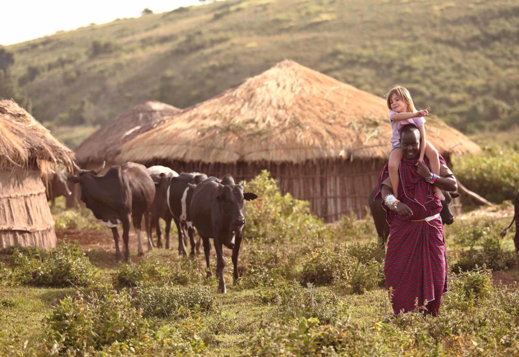 enkosi africa safari tanzania ngorongoro asilia The-Highlands-herding-cattle-family children safari en familia