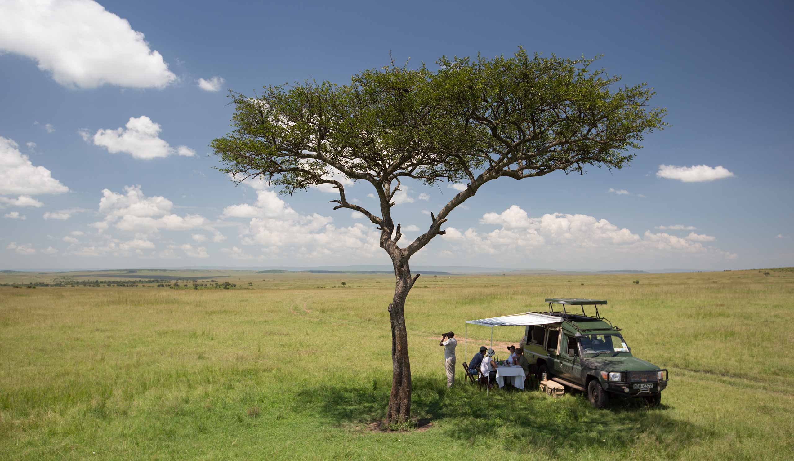 enkosi-africa-safari-kenia-masai-mara-sand-river-camp-elewana-Picnic-Luncheon-(c)-Silverless